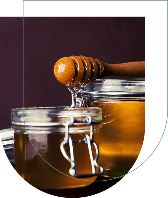 A close up of honey in a jar