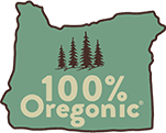 A green map of oregon with trees in the background.