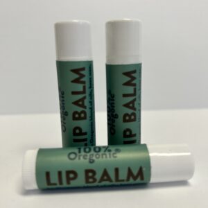 A group of four tubes of lip balm.